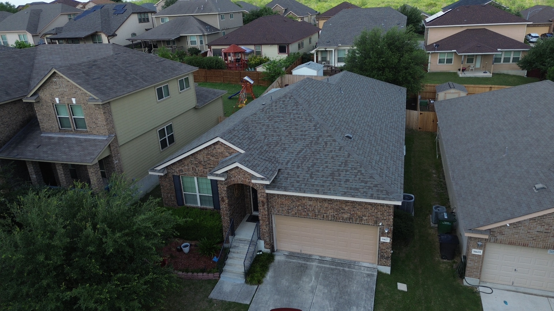 Aerial after photo of a San Antonio, TX home with a brand-new architectural shingle roof installed by Tex-Mex Roofing.